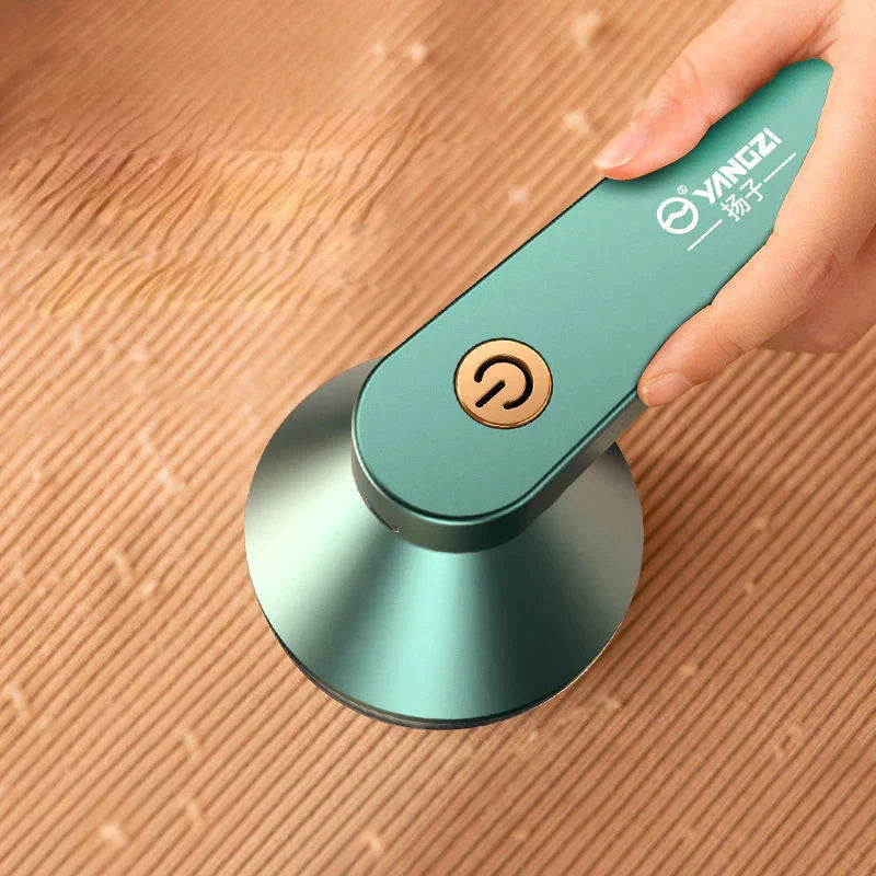 Quita pelusas eléctrico de ropa USB Plus ©
